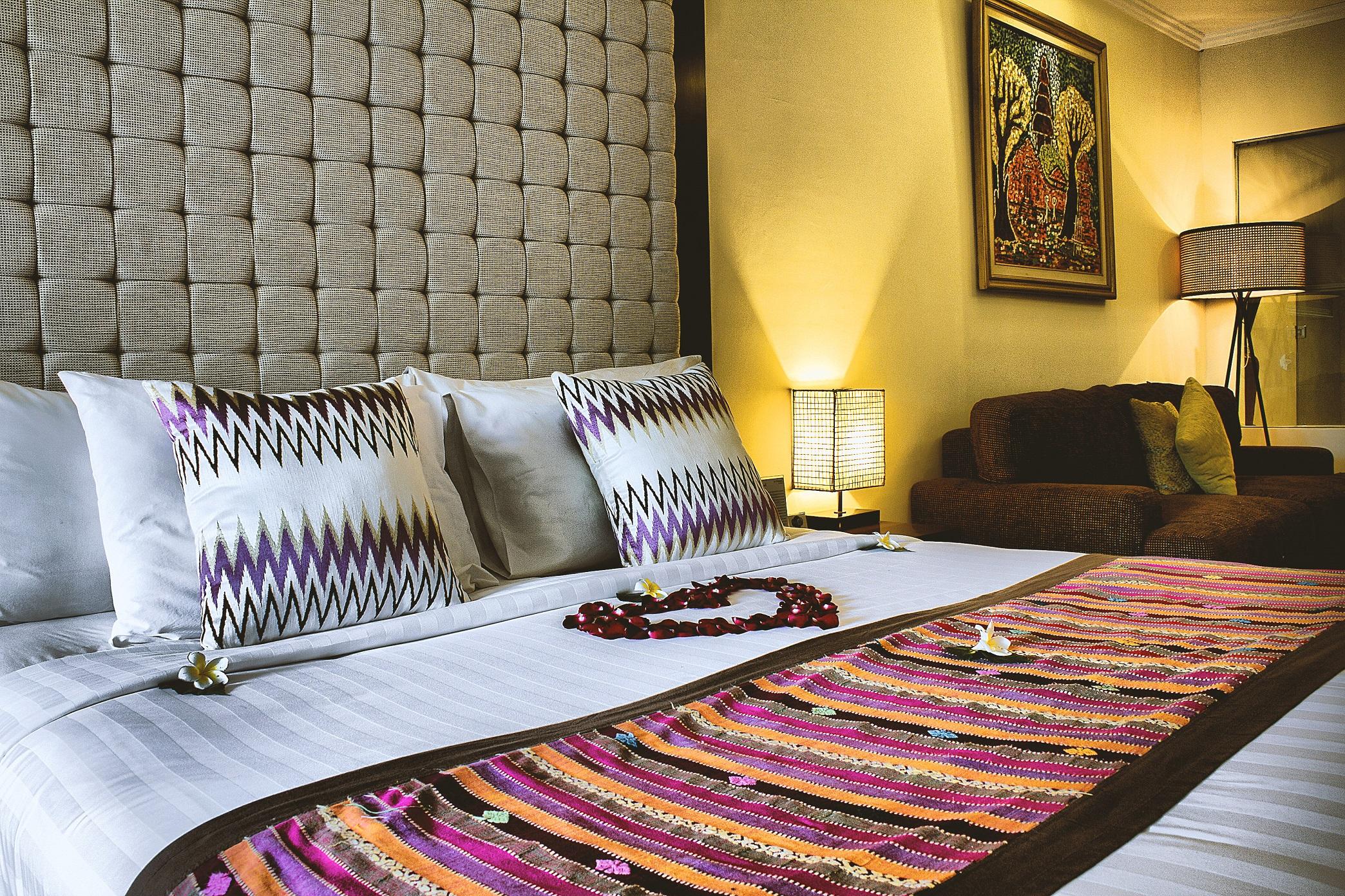 Sagara Villas And Suites Sanur By Ahm Buitenkant foto A bedroom at the hotel