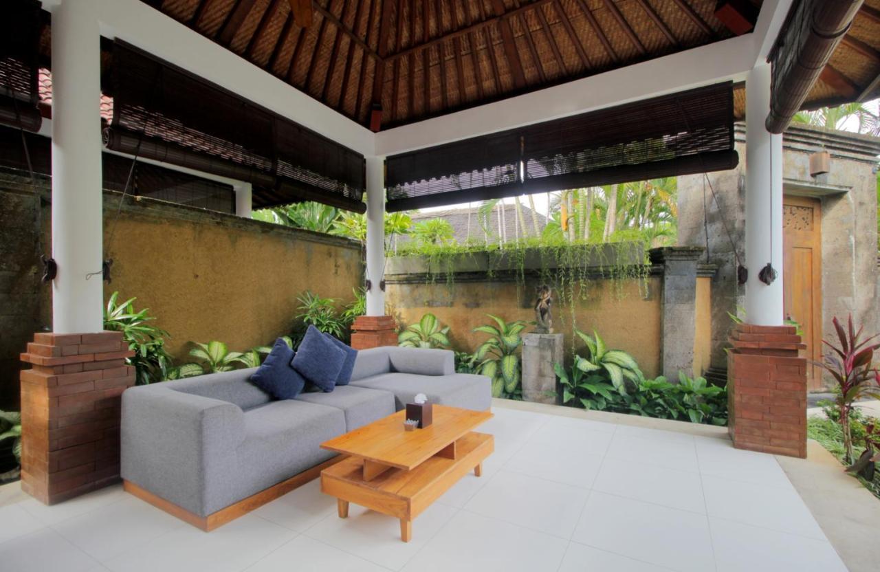 Sagara Villas And Suites Sanur By Ahm Buitenkant foto A bale in a villa in Bali