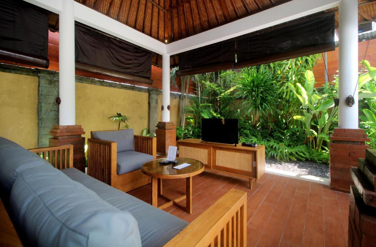 Sagara Villas And Suites Sanur By Ahm Buitenkant foto Living room of a Beach Villa