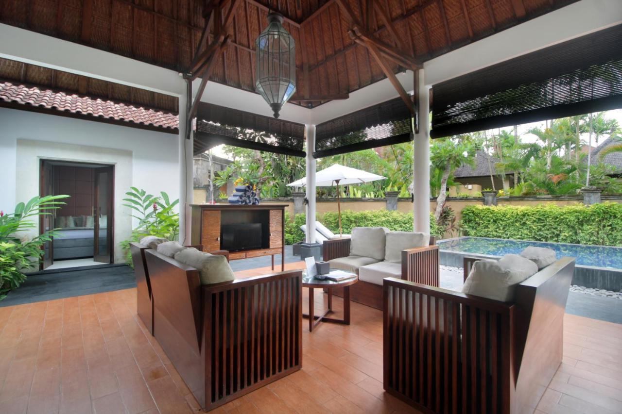Sagara Villas And Suites Sanur By Ahm Buitenkant foto Living room of a pool villa