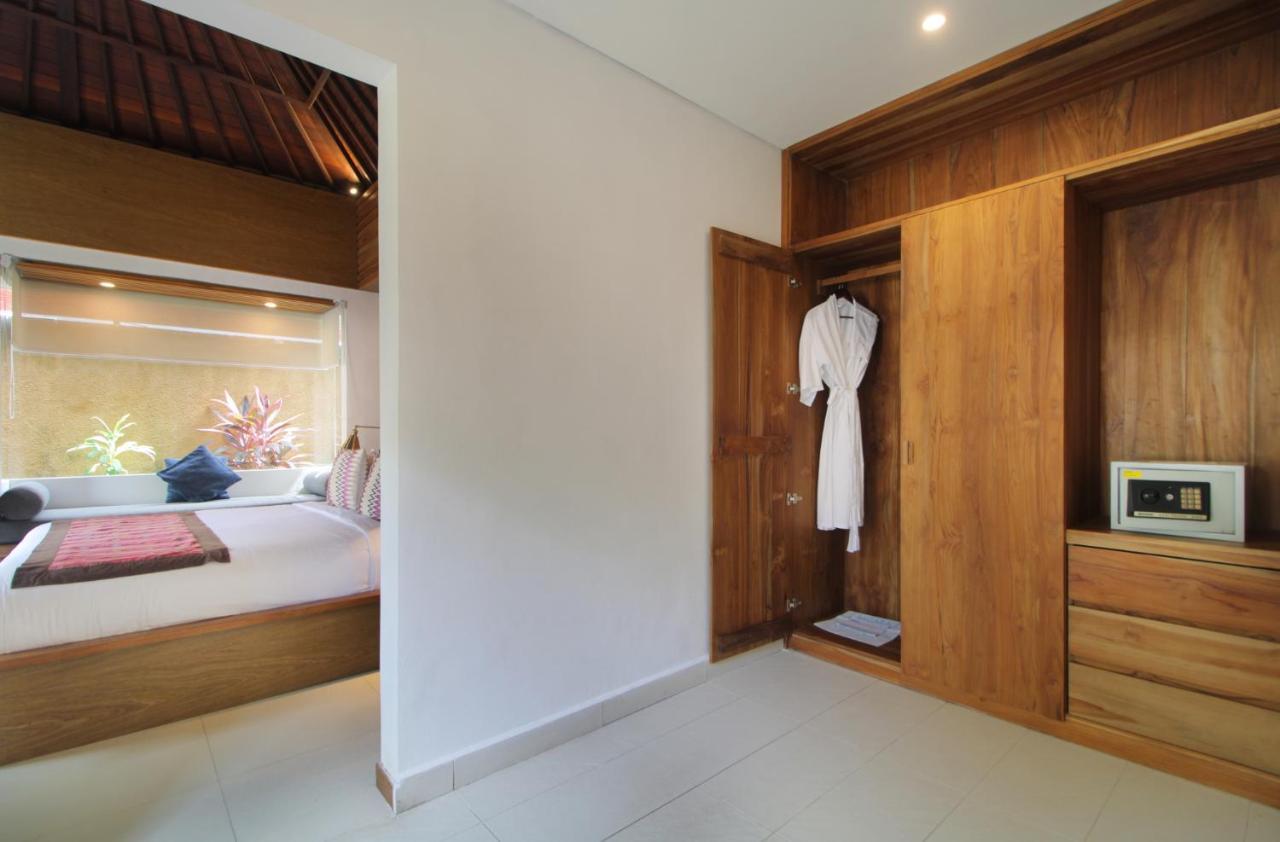 Sagara Villas And Suites Sanur By Ahm Buitenkant foto A room at the hotel