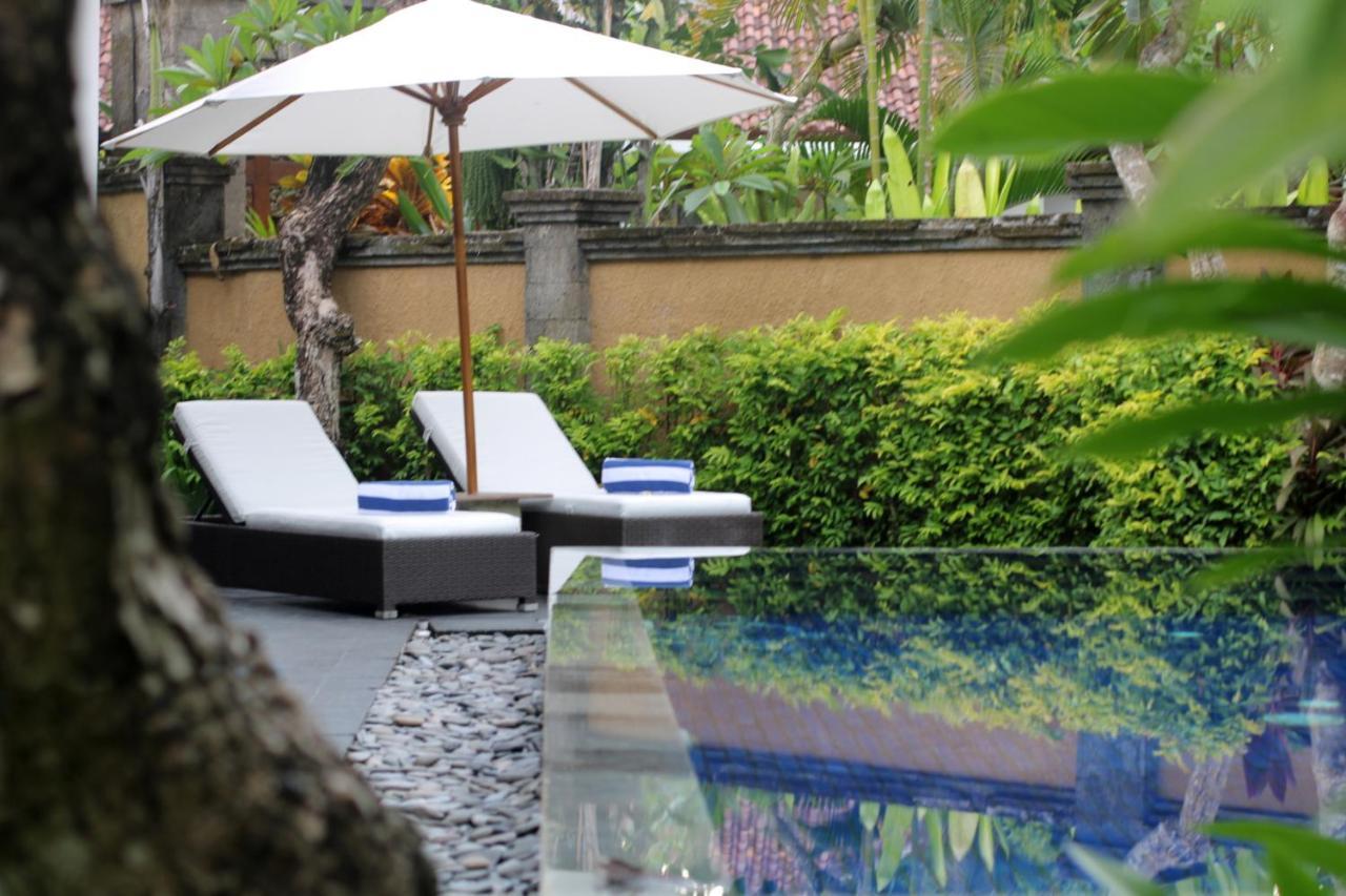 Sagara Villas And Suites Sanur By Ahm Buitenkant foto The swimming pool at the hotel