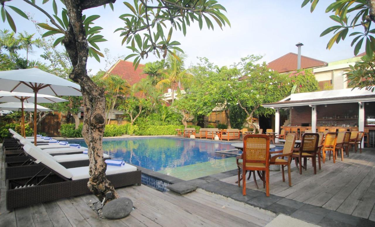 Sagara Villas And Suites Sanur By Ahm Buitenkant foto The swimming pool at the hotel
