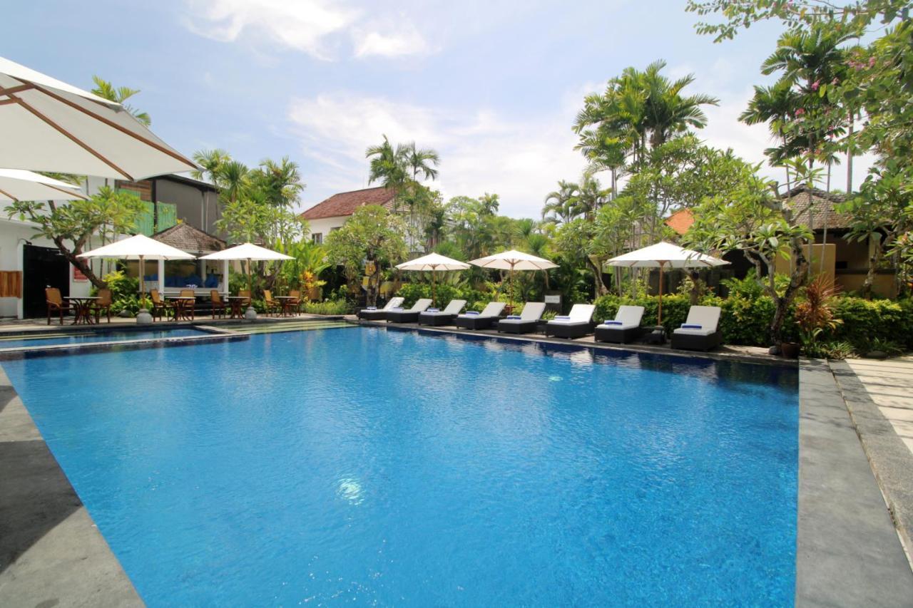 Sagara Villas And Suites Sanur By Ahm Buitenkant foto The swimming pool at the hotel
