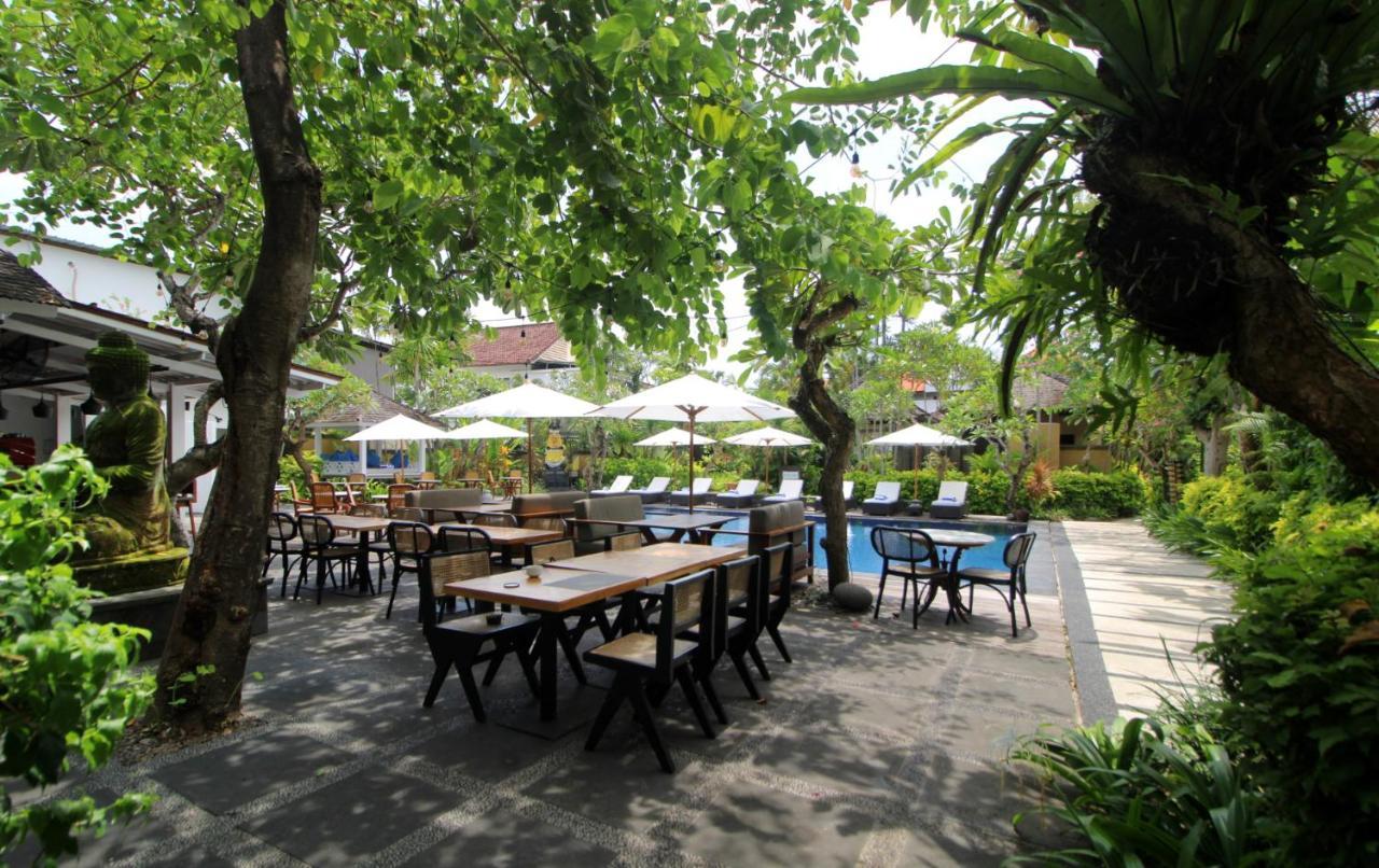 Sagara Villas And Suites Sanur By Ahm Buitenkant foto The restaurant at the hotel