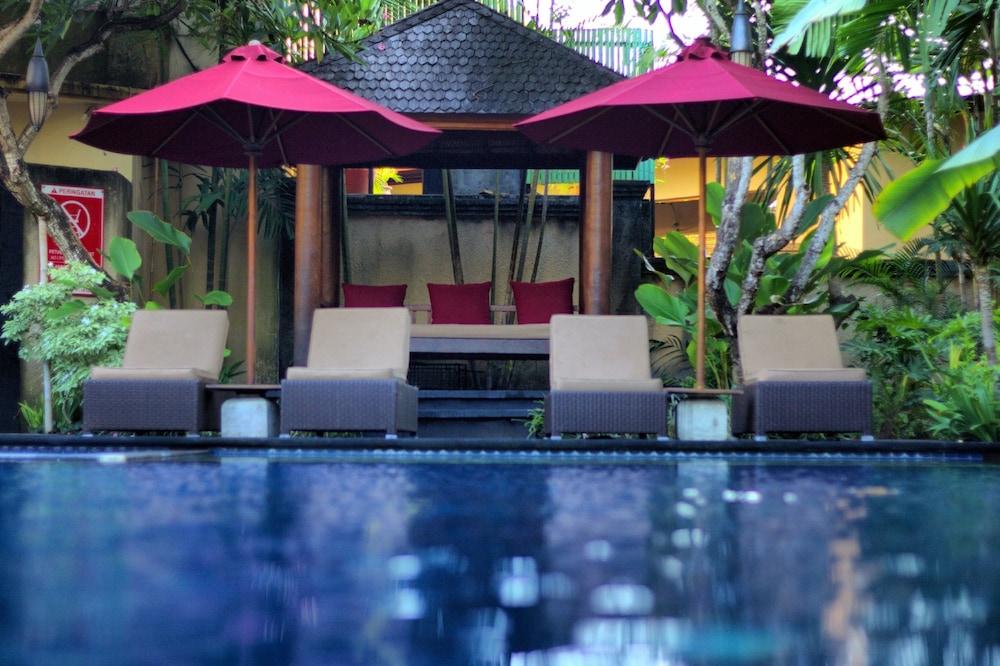 Sagara Villas And Suites Sanur By Ahm Buitenkant foto The swimming pool at the hotel
